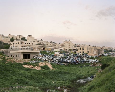 תמונת נוף של כפר ערבי, עבודתה של סג'א קוטינה